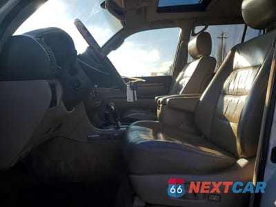 Zdjęcie 7 z 13 samochodu: 2000 LEXUS LX 470 VIN:JT6HT00WXY0082627 - miniatura