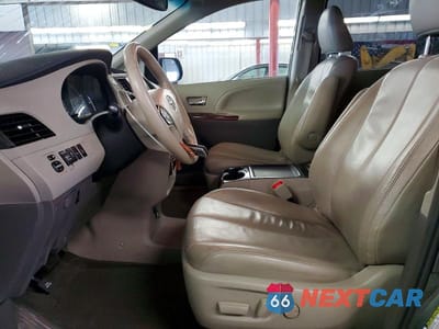 Zdjęcie 7 z 13 samochodu: 2014 TOYOTA SIENNA XLE VIN:5TDYK3DC1ES433088 - miniatura