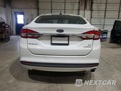Zdjęcie 6 z 12 samochodu: 2017 FORD FUSION SE HYBRID VIN:3FA6P0LU3HR409289 - miniatura