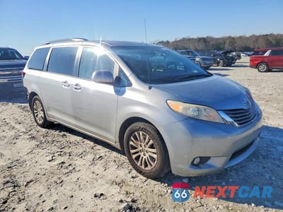 Czwarte zdjęcie samochodu z boku: 2014 TOYOTA SIENNA XLE VIN:5TDYK3DC7ES408759 - miniatura
