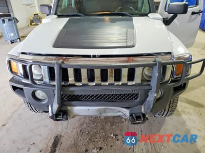 Zdjęcie 11 z 12 samochodu: 2009 HUMMER H3 VIN:5GTEN13E398110701 - miniatura