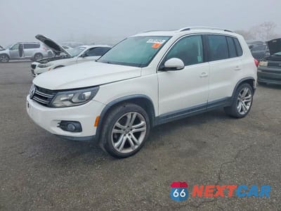 2013 VOLKSWAGEN TIGUAN S WVGAV3AX4DW569600 - główne zdjęcie licytacji z USA - miniatura