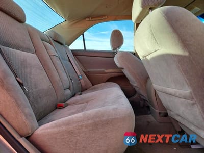 Zdjęcie 10 z 11 samochodu: 2003 TOYOTA CAMRY LE VIN:4T1BE32KX3U771519 - miniatura