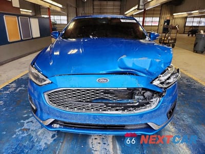Piąte zdjęcie samochodu w środku: 2020 FORD FUSION TITANIUM VIN:3FA6P0D92LR137434 - miniatura