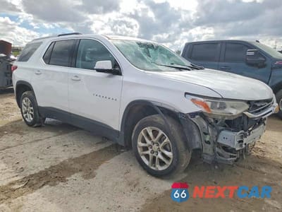 Czwarte zdjęcie samochodu z boku: 2018 CHEVROLET TRAVERSE LT VIN:1GNERGKW1JJ229652 - miniatura