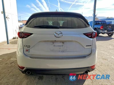 Zdjęcie 6 z 12 samochodu: 2021 MAZDA CX-5 GRAND TOURING VIN:JM3KFBDM7M1457878 - miniatura