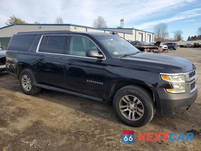 Czwarte zdjęcie samochodu z boku: 2015 CHEVROLET SUBURBAN K1500 LT VIN:1GNSKJKC7FR119837 - miniatura