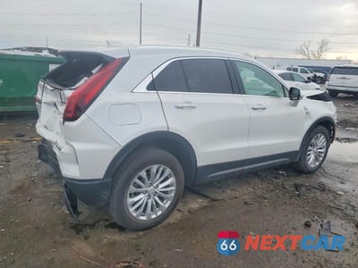 Trzecie zdjęcie samochodu z tyłu: 2024 CADILLAC XT4 LUXURY VIN:1GYFZBR40RF221216 - miniatura