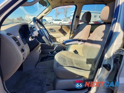 Zdjęcie 7 z 12 samochodu: 2003 FORD ESCAPE XLT VIN:1FMYU03163KC57843 - miniatura