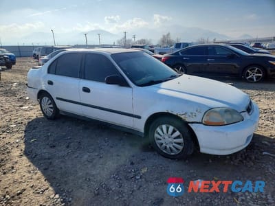 Czwarte zdjęcie samochodu z boku: 1997 HONDA CIVIC LX VIN:1HGEJ6676VL036602 - miniatura