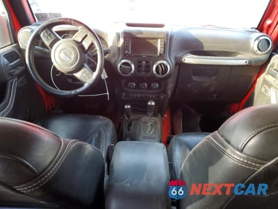 Zdjęcie 8 z 13 samochodu: 2015 JEEP WRANGLER UNLIMITED SAHARA VIN:1C4BJWEG1FL594538 - miniatura