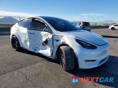 Czwarte zdjęcie samochodu z boku: 2022 TESLA MODEL Y VIN:7SAYGDEF5NF538191 - miniatura