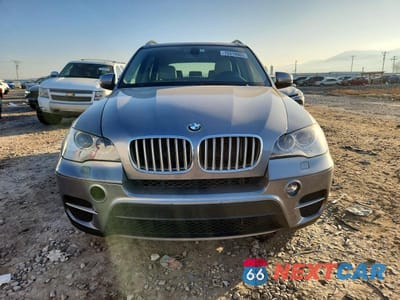 Piąte zdjęcie samochodu w środku: 2012 BMW X5 VIN:5UXZV4C52CL748113 - miniatura