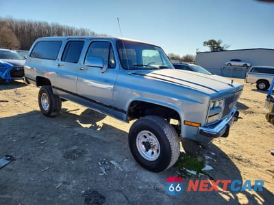 Czwarte zdjęcie samochodu z boku: 1991 GMC SUBURBAN V25 CONVENTIONAL VIN:1GKGV26K5MF504314 - miniatura