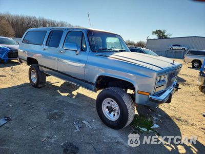 Czwarte zdjęcie samochodu z boku: 1991 GMC SUBURBAN V25 CONVENTIONAL VIN:1GKGV26K5MF504314 - miniatura