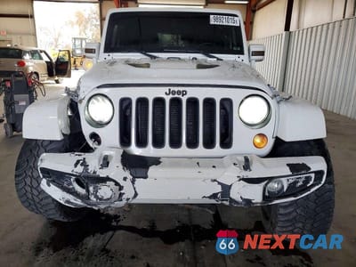 Piąte zdjęcie samochodu w środku: 2015 JEEP WRANGLER UNLIMITED SAHARA VIN:1C4BJWEG1FL643527 - miniatura