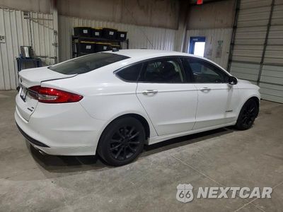Trzecie zdjęcie samochodu z tyłu: 2017 FORD FUSION SE HYBRID VIN:3FA6P0LU3HR409289 - miniatura
