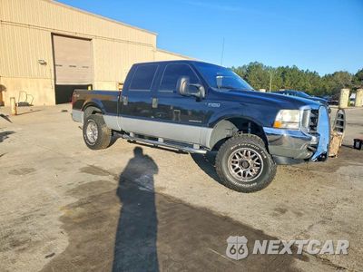 Czwarte zdjęcie samochodu z boku: 2002 FORD F250 SUPER DUTY VIN:1FTNW21FX2EB68995 - miniatura