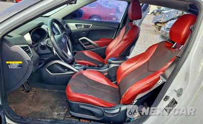 Zdjęcie 7 z 12 samochodu: 2012 HYUNDAI VELOSTER VIN:KMHTC6AD2CU064493 - miniatura