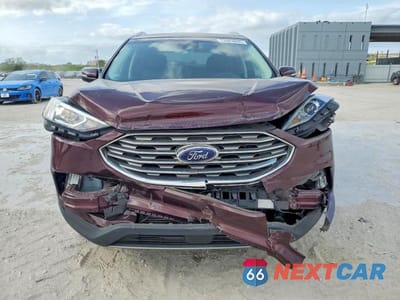 Piąte zdjęcie samochodu w środku: 2019 FORD EDGE TITANIUM VIN:2FMPK3K90KBC15770 - miniatura