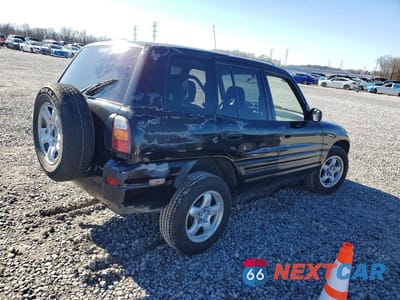 Trzecie zdjęcie samochodu z tyłu: 2000 TOYOTA RAV4 BASE VIN:JT3GP10V9Y7065464 - miniatura