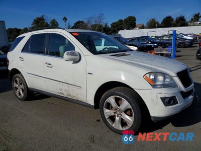 Czwarte zdjęcie samochodu z boku: 2010 MERCEDES-BENZ ML 350 BLUETEC VIN:4JGBB2FB6AA612301 - miniatura
