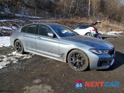 Czwarte zdjęcie samochodu z boku: 2022 BMW 530 XI VIN:WBA13BJ01NWX57691 - miniatura