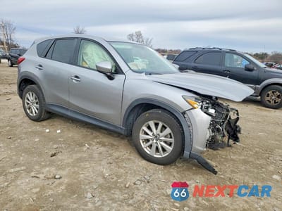 Czwarte zdjęcie samochodu z boku: 2014 MAZDA CX-5 SPORT VIN:JM3KE2BE0E0398436 - miniatura