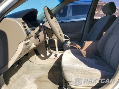 Zdjęcie 7 z 12 samochodu: 2001 TOYOTA COROLLA CE VIN:1NXBR12E61Z458631 - miniatura