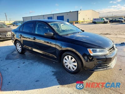 Czwarte zdjęcie samochodu z boku: 2016 VOLKSWAGEN JETTA S VIN:3VW267AJ7GM347451 - miniatura