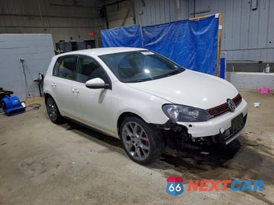 Czwarte zdjęcie samochodu z boku: 2014 VOLKSWAGEN GTI VIN:WVWGD7AJ6EW009874 - miniatura