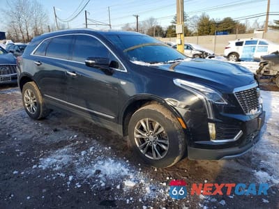 Czwarte zdjęcie samochodu z boku: 2021 CADILLAC XT5 PREMIUM LUXURY VIN:1GYKNDRS8MZ107802 - miniatura