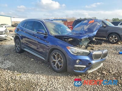 Czwarte zdjęcie samochodu z boku: 2018 BMW X1 SDRIVE28I VIN:WBXHU7C3XJ5L09729 - miniatura