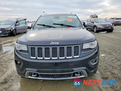 Piąte zdjęcie samochodu w środku: 2014 JEEP GRAND CHEROKEE OVERLAND VIN:1C4RJFCM4EC521167 - miniatura