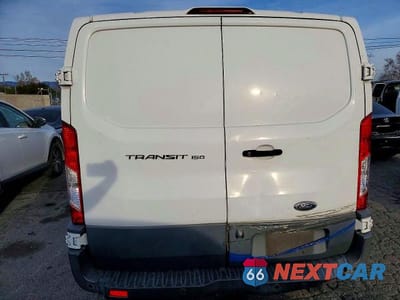 Zdjęcie 6 z 13 samochodu: 2018 FORD TRANSIT 150 DELIVERY VAN VIN:1FTYE1YM7JKA79271 - miniatura