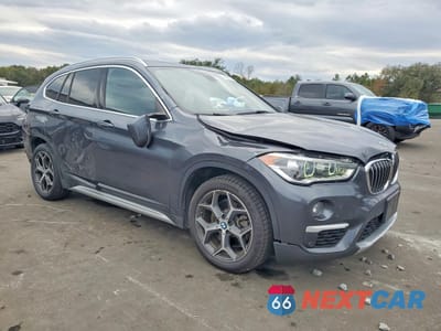 Czwarte zdjęcie samochodu z boku: 2019 BMW X1 XDRIVE28I VIN:WBXHT3C54K5L90726 - miniatura