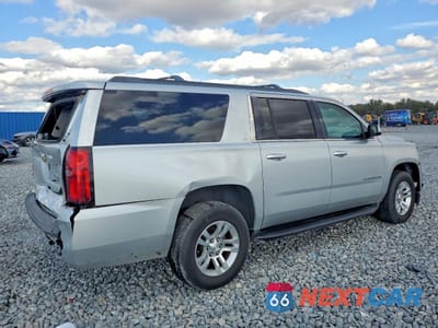 Trzecie zdjęcie samochodu z tyłu: 2019 CHEVROLET SUBURBAN C1500 LT VIN:1GNSCHKC6KR201509 - miniatura