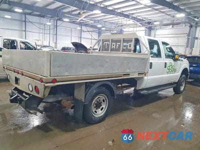 Trzecie zdjęcie samochodu z tyłu: 2012 FORD F350 SUPER DUTY FLATBED TRUCK VIN:1FD8W3F67CEA33594 - miniatura