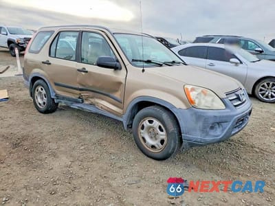 Czwarte zdjęcie samochodu z boku: 2006 HONDA CR-V LX VIN:JHLRD68556C027946 - miniatura