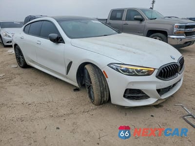 Czwarte zdjęcie samochodu z boku: 2022 BMW M850XI VIN:WBAGV8C01NCH27406 - miniatura