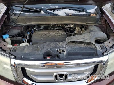 Zdjęcie 12 z 12 samochodu: 2011 HONDA PILOT VIN:5FNYF4H75BB020761 - miniatura