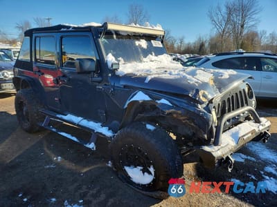 Czwarte zdjęcie samochodu z boku: 2016 JEEP WRANGLER UNLIMITED SPORT VIN:1C4BJWDG3GL191843 - miniatura