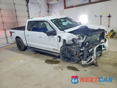 Czwarte zdjęcie samochodu z boku: 2024 FORD F150 XLT VIN:1FTFW3LD4RFB36599 - miniatura