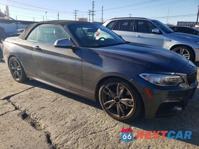 Czwarte zdjęcie samochodu z boku: 2015 BMW M235I VIN:WBA1M1C56FV393629 - miniatura