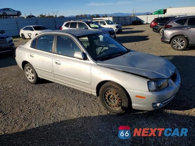 Czwarte zdjęcie samochodu z boku: 2005 HYUNDAI ELANTRA GLS VIN:KMHDN46D75U978169 - miniatura