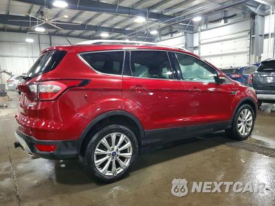 Trzecie zdjęcie samochodu z tyłu: 2017 FORD ESCAPE TITANIUM VIN:1FMCU9J92HUB62618 - miniatura