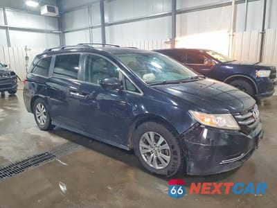 Czwarte zdjęcie samochodu z boku: 2014 HONDA ODYSSEY EXL VIN:5FNRL5H61EB098212 - miniatura
