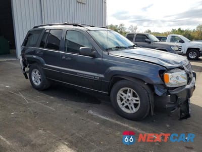 Czwarte zdjęcie samochodu z boku: 2004 JEEP GRAND CHEROKEE LAREDO VIN:1J4GW48S14C243812 - miniatura