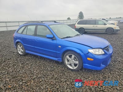 Czwarte zdjęcie samochodu z boku: 2003 MAZDA PROTEGE PR5 VIN:JM1BJ246131192690 - miniatura
