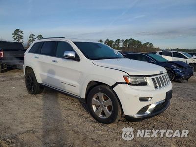 Czwarte zdjęcie samochodu z boku: 2014 JEEP GRAND CHEROKEE SUMMIT VIN:1C4RJFJT8EC346884 - miniatura